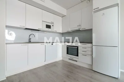 Kitchen; kitchen appliances, tile floor, wood floor, renovated, natural light