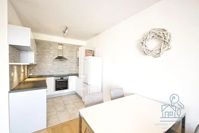 Kitchen; kitchen appliances, tile floor, natural light