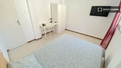Bedroom; natural light, tile floor