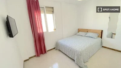 Bedroom; natural light, tile floor
