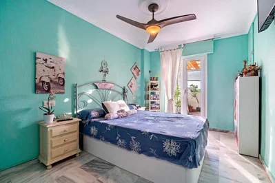 Bedroom; natural light, tile floor