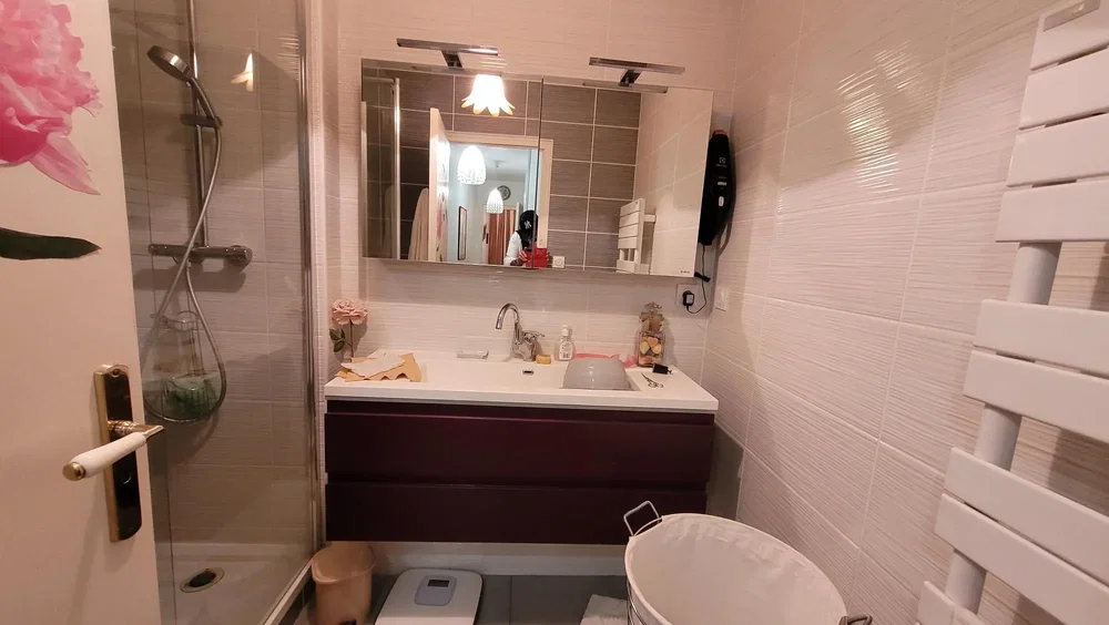 Toilet; tile floor, natural light