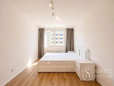 Bedroom; wood floor, natural light