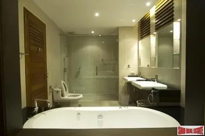 Bathroom; tile floor, renovated, natural light, modern style