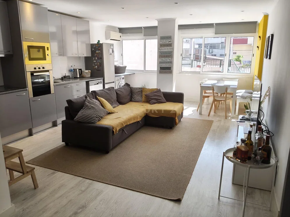 Living room; kitchen appliances, natural light, wood floor, modern style