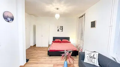 Bedroom; natural light, wood floor