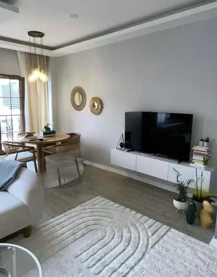 Salón; luz natural, suelo de madera, estilo moderno