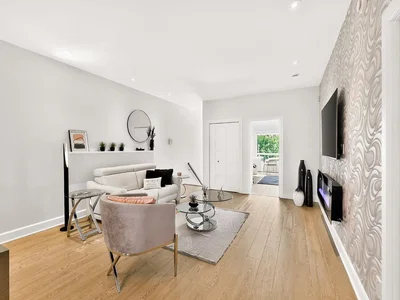 Living room; wood floor, natural light, modern style, fireplace