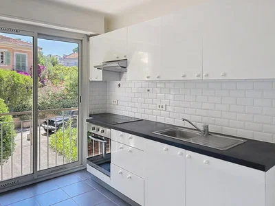 Kitchen; kitchen appliances, view, tile floor, natural light