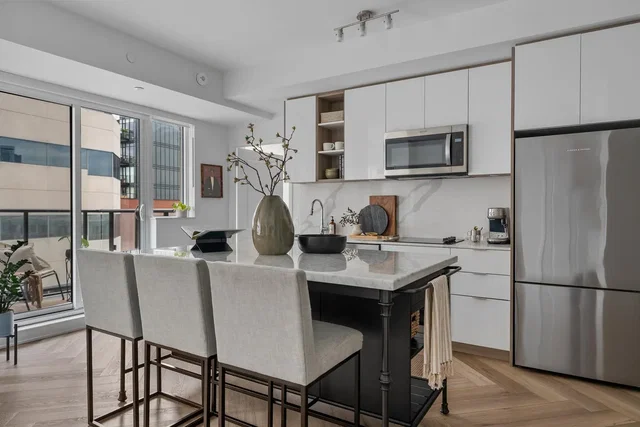 Kitchen; kitchen appliances, wood floor, natural light, modern style