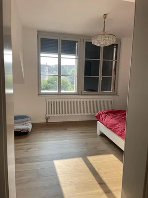 Slaapkamer; natuurlijk licht, houten vloer