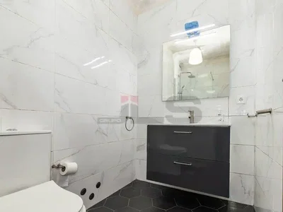 Toilet; tile floor, renovated, natural light