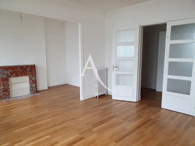 Living room; wood floor, fireplace, natural light