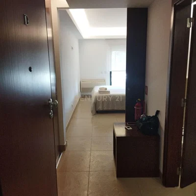 Bedroom; tile floor, natural light