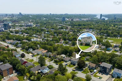 House and surroundings; view