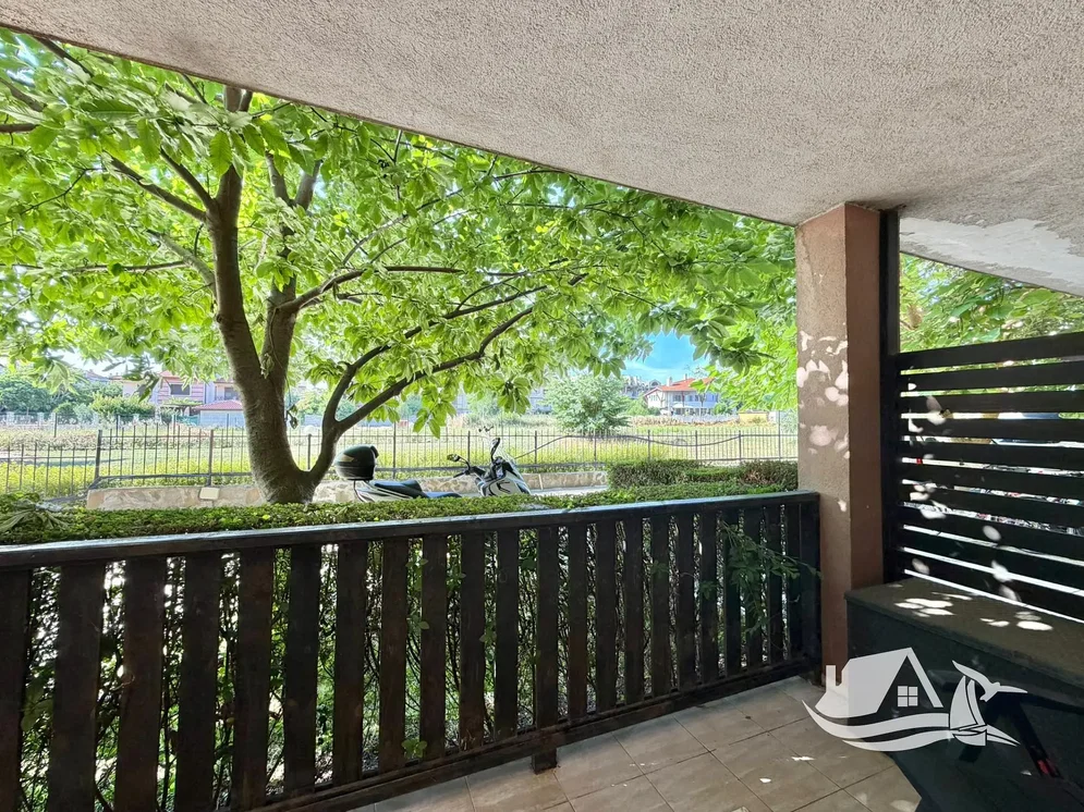 Balcony; natural light, tile floor, view