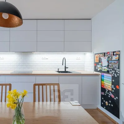Kitchen; kitchen appliances, wood floor, natural light