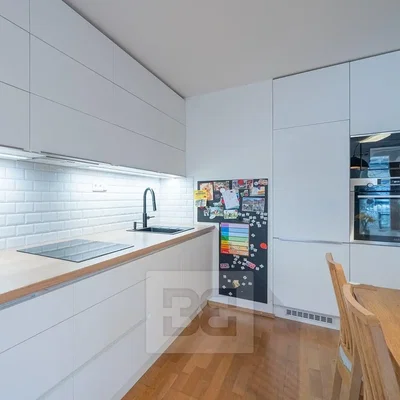 Kitchen; kitchen appliances, wood floor, natural light