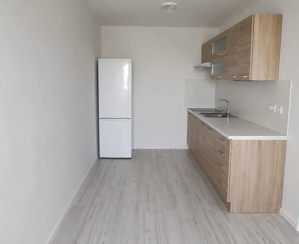 Kitchen; kitchen appliances, tile floor, natural light, renovated