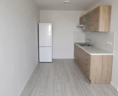 Kitchen; kitchen appliances, tile floor, natural light, renovated
