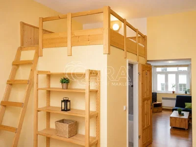 Bedroom; wood beams, wood floor, natural light, rustic style