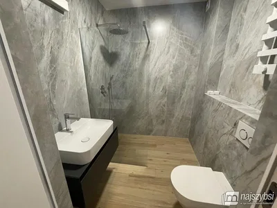 Bathroom; tile floor, wood floor, renovated, natural light