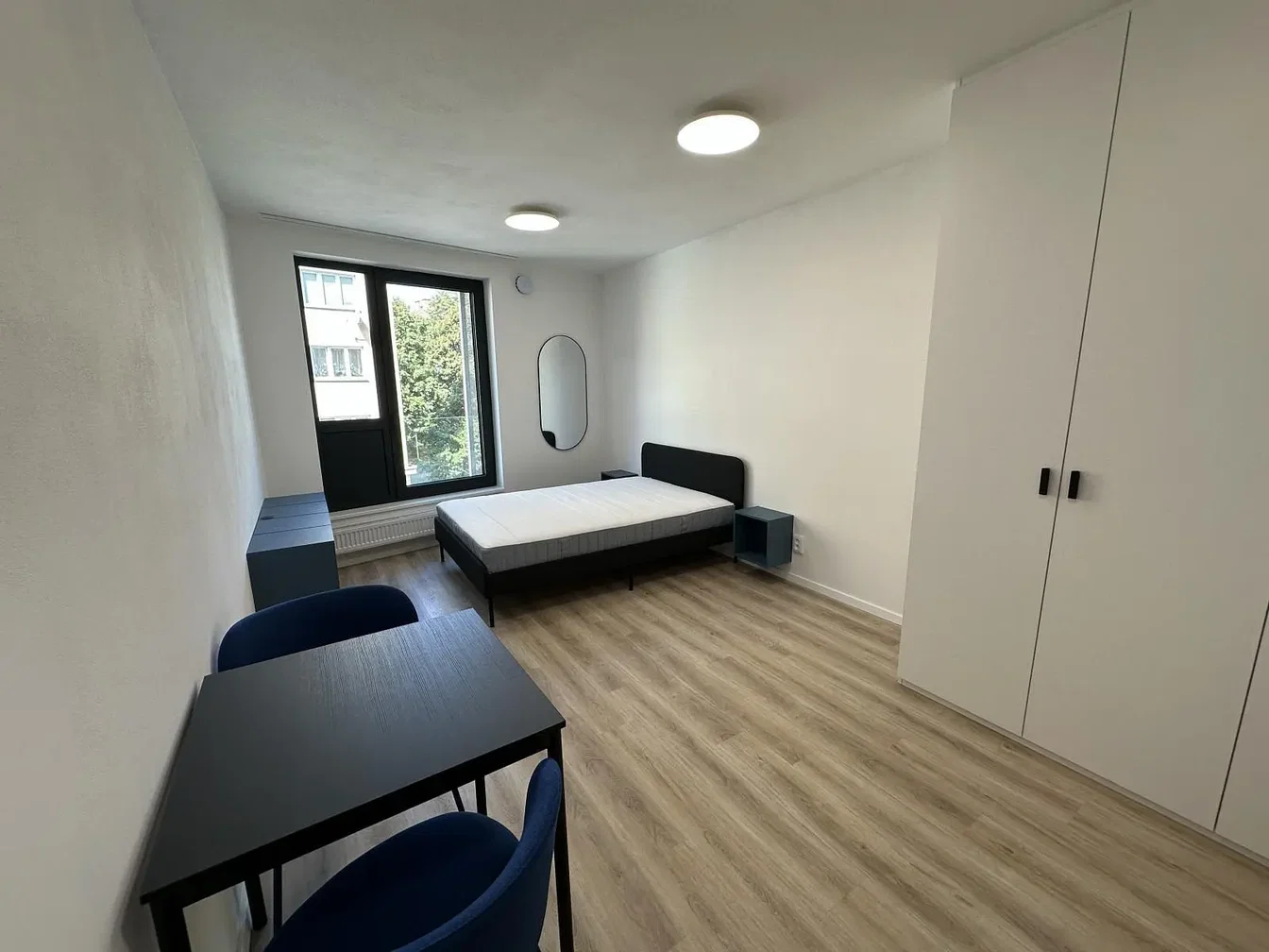 Bedroom; natural light, wood floor