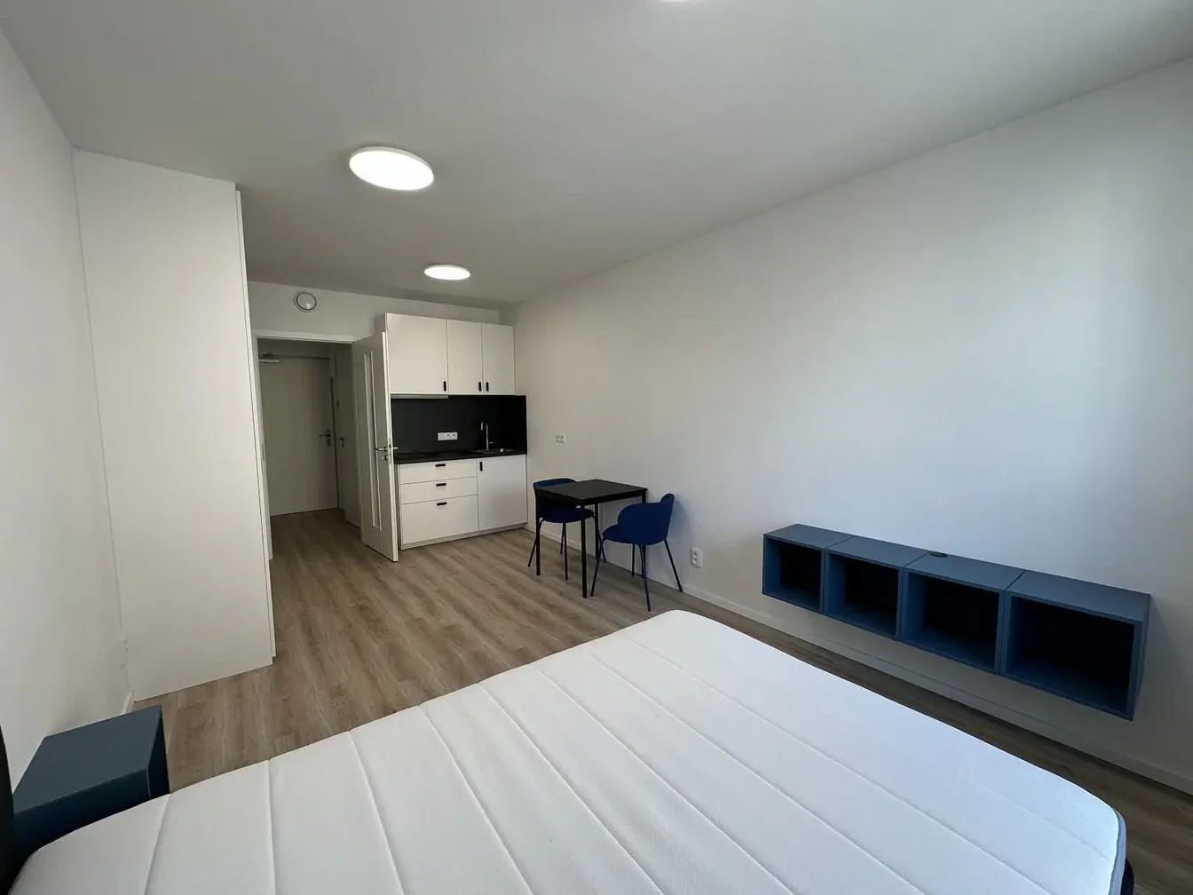 Bedroom; natural light, wood floor
