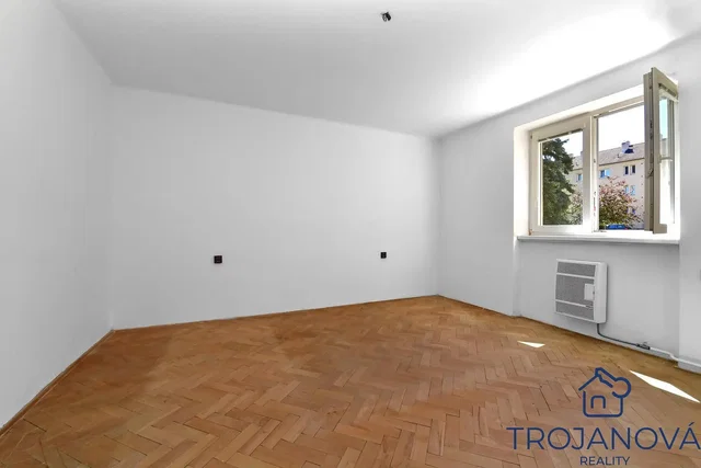 Bedroom; wood floor, natural light, needs renovation