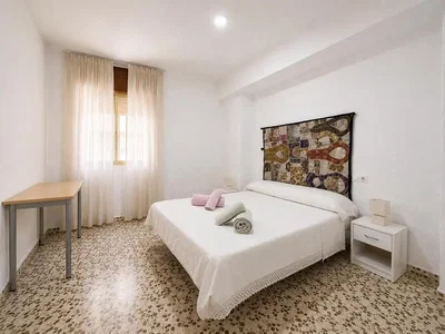 Bedroom; natural light, tile floor