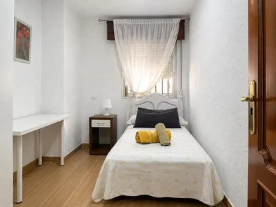 Bedroom; natural light, wood floor