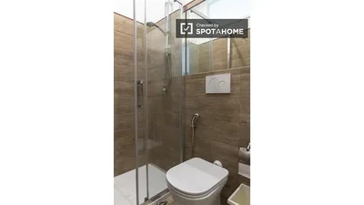 Toilet; tile floor, renovated