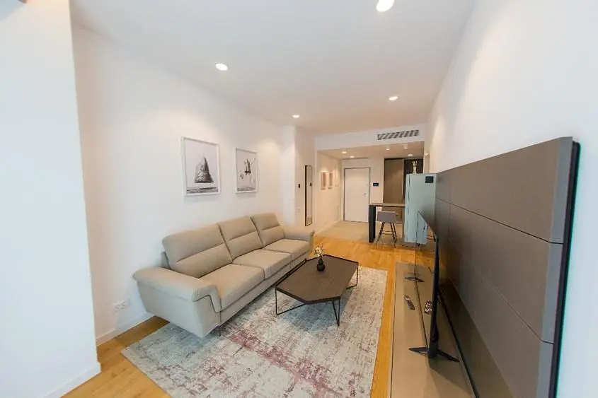 Living room; wood floor, natural light, modern style