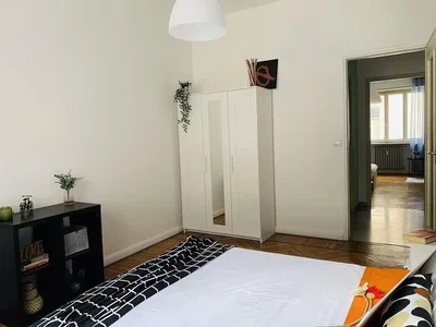 Bedroom; wood floor, natural light