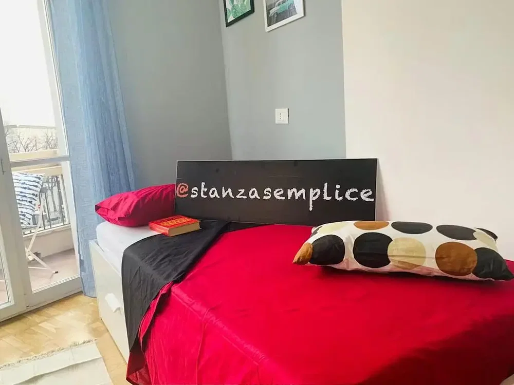 Bedroom; natural light, wood floor
