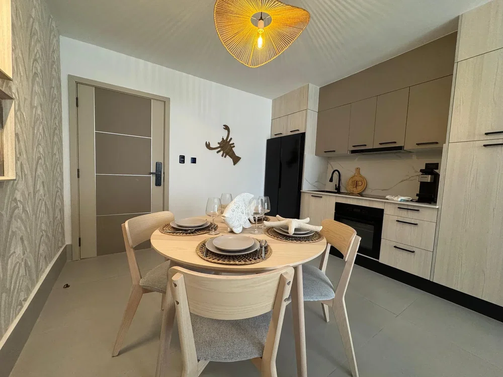 Kitchen; kitchen appliances, tile floor, renovated, natural light