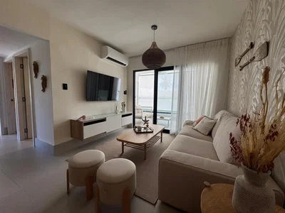 Living room; natural light, tile floor, modern style
