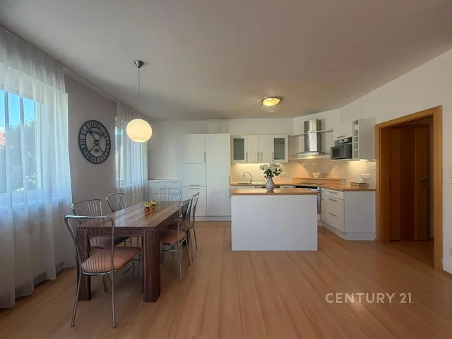 Kitchen; kitchen appliances, wood floor, natural light