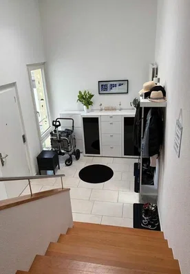 Cloakroom; tile floor, wood floor, natural light