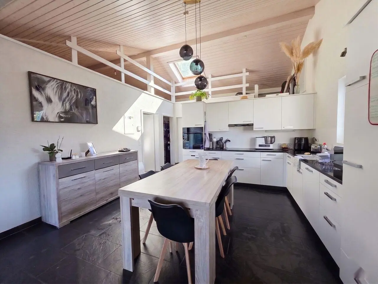 Kitchen; kitchen appliances, tile floor, natural light