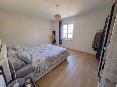 Bedroom; wood floor, natural light