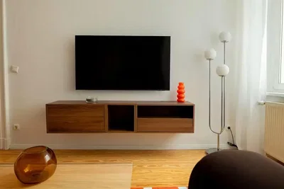 Living room; wood floor, natural light, modern style