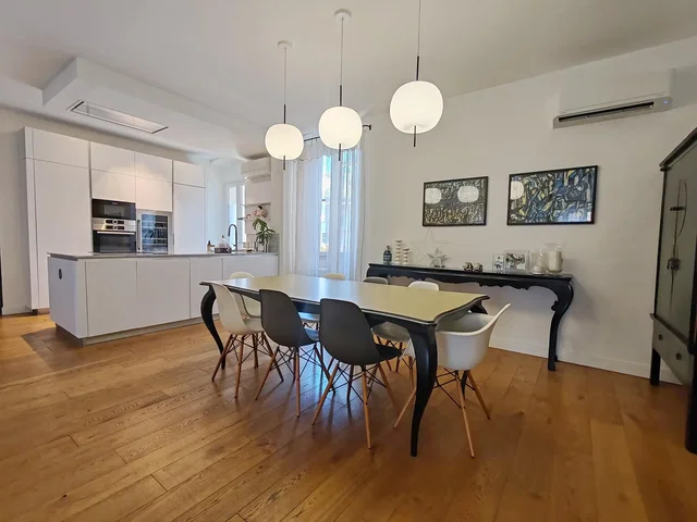 Kitchen; kitchen appliances, wood floor, natural light