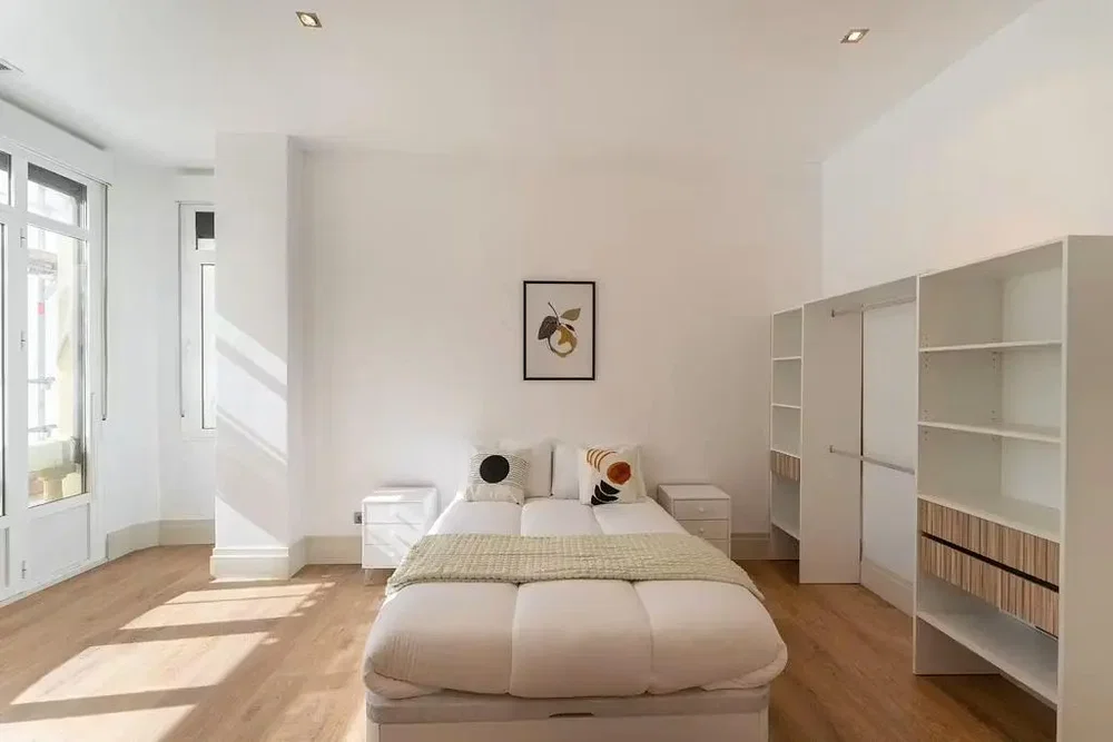 Bedroom; wood floor, natural light