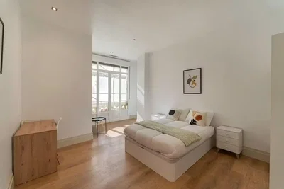 Bedroom; wood floor, natural light