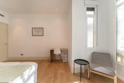 Bedroom; wood floor, natural light