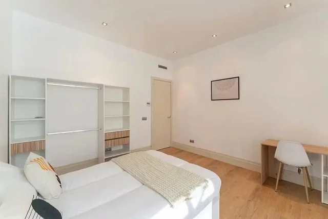 Bedroom; wood floor, natural light