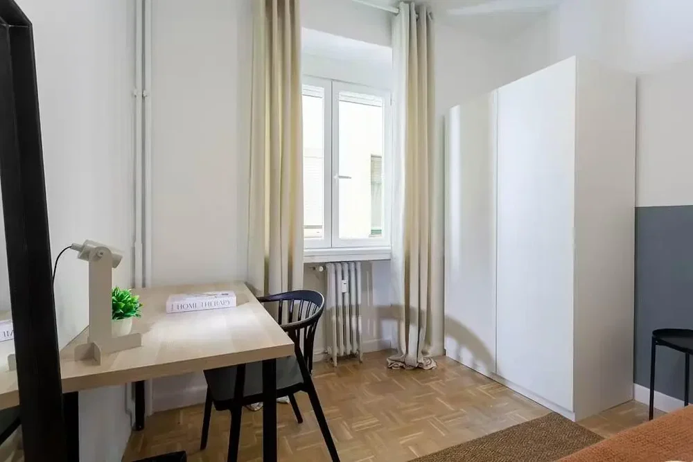 Bedroom; natural light, wood floor