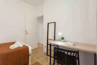 Bedroom; natural light, wood floor, tile floor