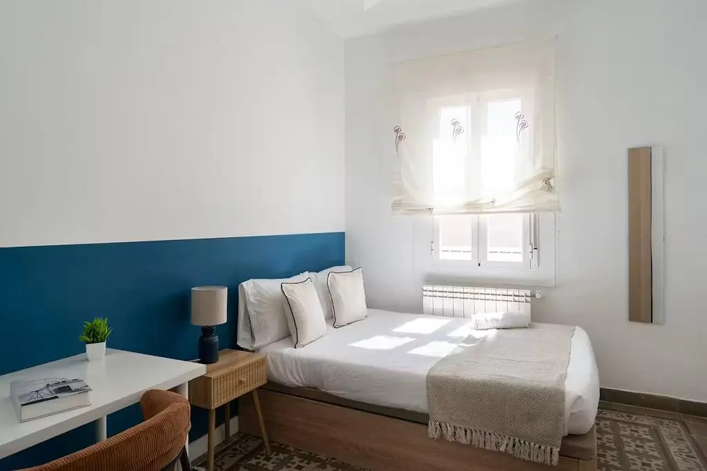Bedroom; natural light, wood floor